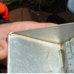 small tray with measure tape inside to measure small fish