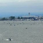 Boats in river near airport