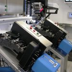 Close up of two lines and a sorter.  Notice the tubes below the cabinet are used to go from the sorter to the various tag lines in the automated trailer.